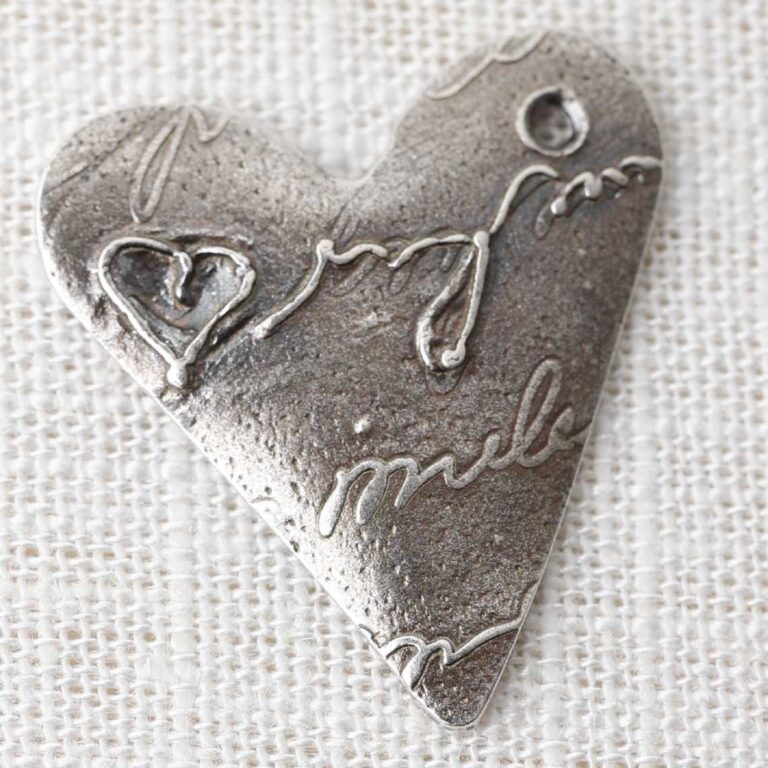 Personalized silver heart charm made with metal clay